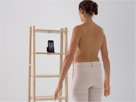Woman taking photos on smartphone
