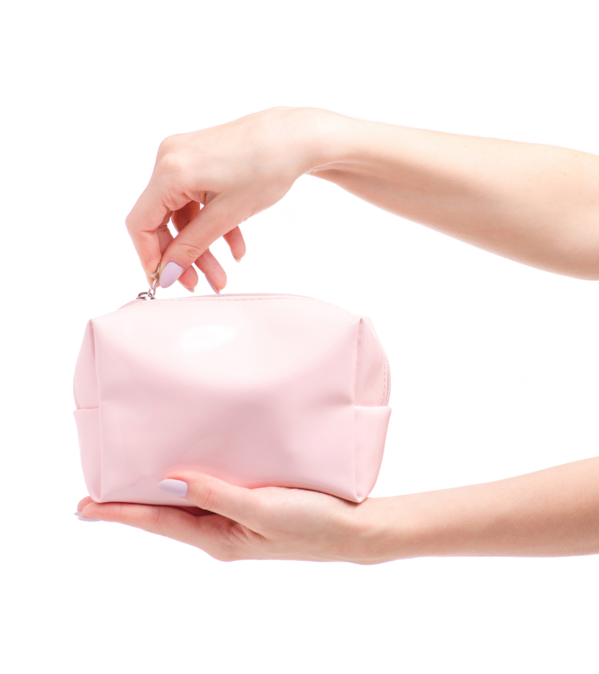 Hands holding a pink purse